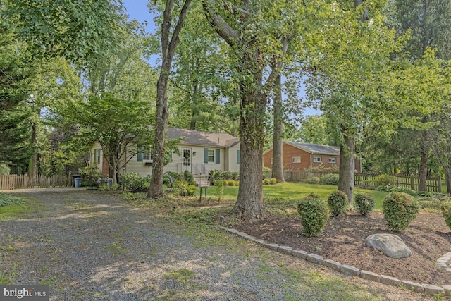 10702 Orchard St, Fairfax, VA 22030 - view of front of home with view of wooded area