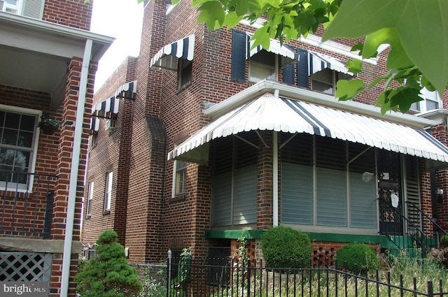 610 NE 21st St NE, Washington, DC 20002 - view of side of home featuring brick siding