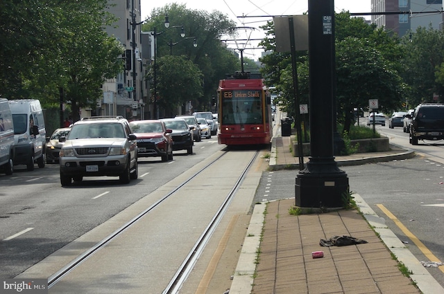 610 NE 21st St NE, Washington, DC 20002 - view of asphalt street with sidewalks, street lighting, curbs, and traffic signs