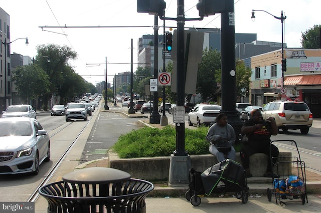 610 NE 21st St NE, Washington, DC 20002 - view of asphalt road with sidewalks, street lights, traffic signs, traffic lights, and curbs