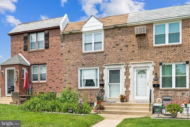 941 Fairfax Rd, Drexel Hill, PA 19026 - multi unit property with brick siding, a high end roof, and a front yard