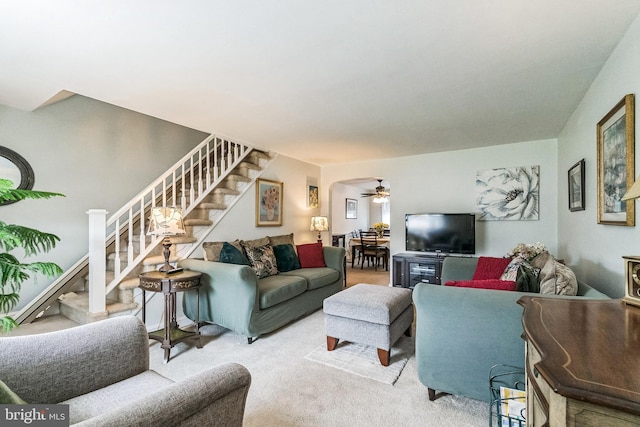 941 Fairfax Rd, Drexel Hill, PA 19026 - living room with stairs, a ceiling fan, and carpet flooring