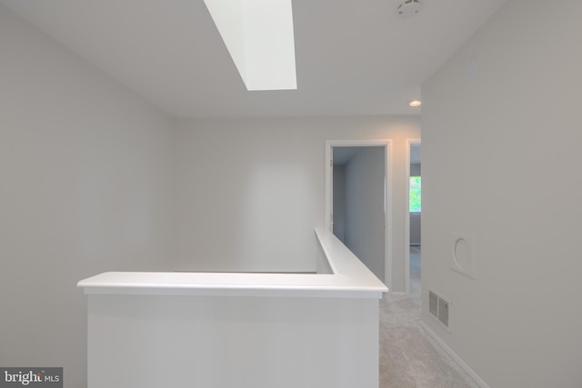 302 Five Farms Ln, Lutherville Timonium, MD 21093 - hallway featuring a skylight, light carpet, and recessed lighting