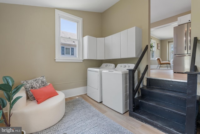 1224 W Mill St, Quakertown, PA 18951 - laundry room with washer and clothes dryer, light wood-type flooring, and baseboards