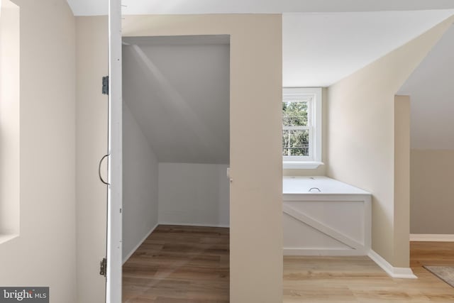 1224 W Mill St, Quakertown, PA 18951 - bathroom featuring wood finished floors, a bath, and baseboards
