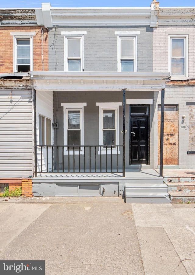 916 S 8th St, Camden, NJ 08102 - entrance to property featuring brick siding and a porch