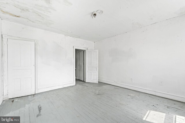 916 S 8th St, Camden, NJ 08102 - unfurnished room with wood finished floors