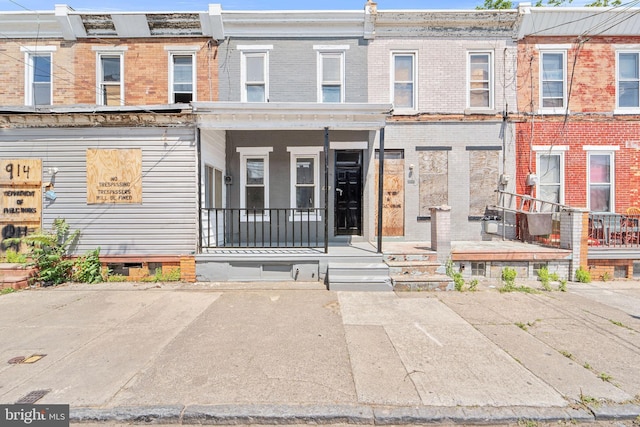 916 S 8th St, Camden, NJ 08102 - view of property with brick siding and a porch