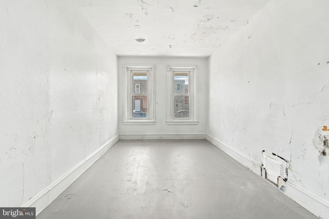 916 S 8th St, Camden, NJ 08102 - spare room with baseboards and concrete flooring