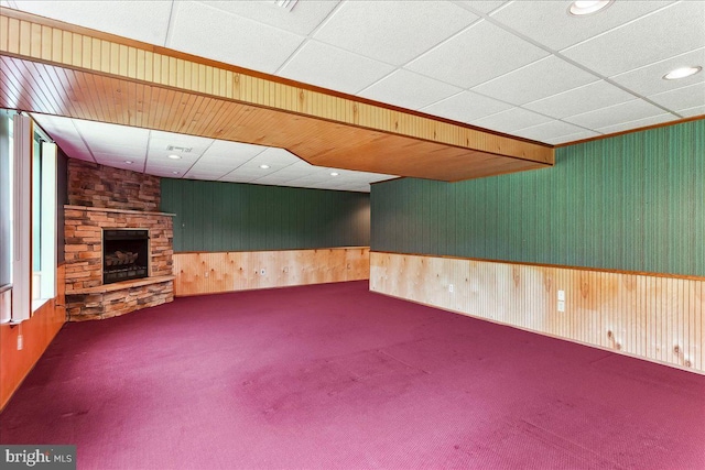 916 E Fox Hound Chase Chase, Glen Mills, PA 19342 - below grade area with carpet flooring, a fireplace, wooden walls, and a wainscoted wall
