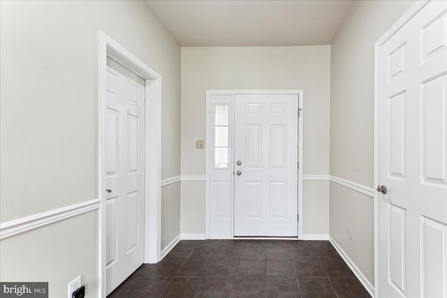 916 E Fox Hound Chase Chase, Glen Mills, PA 19342 - foyer entrance featuring baseboards and dark tile patterned flooring