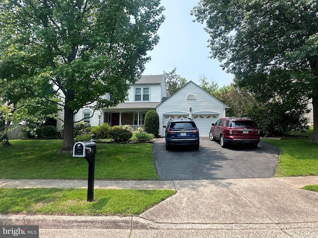 1024 Page Ct, Herndon, VA 20170 - view of front of house featuring a front lawn and driveway