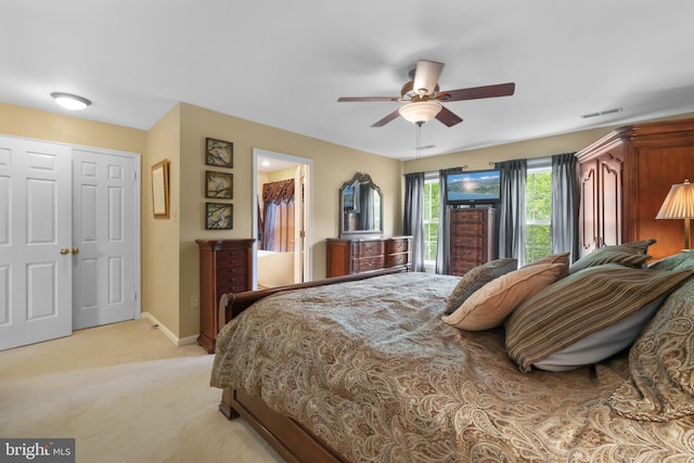 1024 Page Ct, Herndon, VA 20170 - bedroom with light carpet, baseboards, ceiling fan, and a closet
