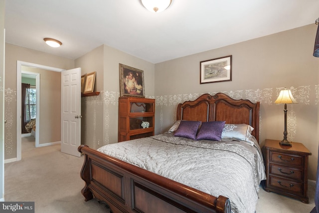 1024 Page Ct, Herndon, VA 20170 - bedroom with light carpet and baseboards