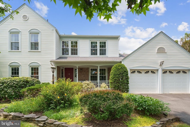 1024 Page Ct, Herndon, VA 20170 - traditional home featuring driveway and an attached garage