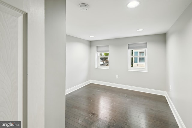 329 S Durham St, Baltimore, MD 21231 - unfurnished room featuring dark wood finished floors, baseboards, recessed lighting, and a smoke detector
