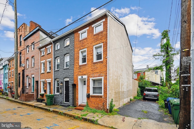 329 S Durham St, Baltimore, MD 21231 - view of front of home featuring brick siding and entry steps