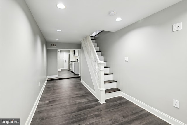 329 S Durham St, Baltimore, MD 21231 - staircase featuring recessed lighting, wood finished floors, and baseboards