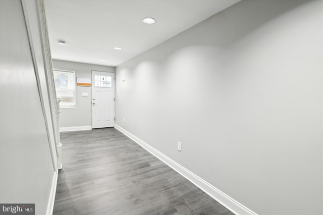 329 S Durham St, Baltimore, MD 21231 - hall featuring wood finished floors, baseboards, and recessed lighting
