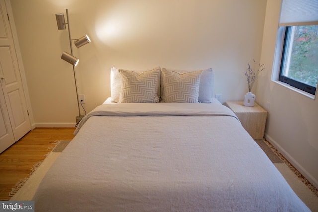 244 10th St NE, Washington, DC 20002 - bedroom with baseboards and wood finished floors