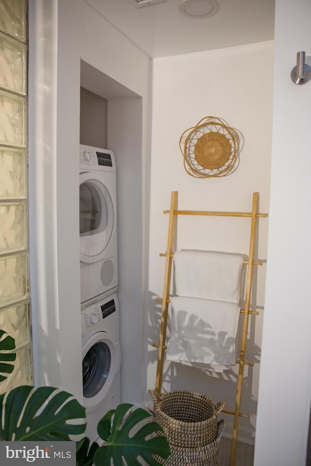 244 10th St NE, Washington, DC 20002 - laundry room featuring stacked washing machine and dryer