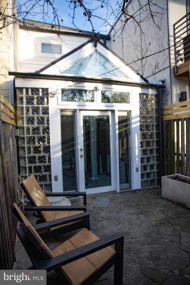 244 10th St NE, Washington, DC 20002 - back of house with stone siding and a patio area