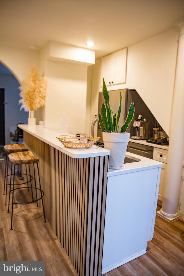 244 10th St NE, Washington, DC 20002 - indoor bar featuring dark wood-style floors and arched walkways