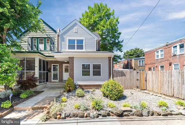 506 W 34th St, Wilmington, DE 19802 - view of front of house with a gate and a sunroom