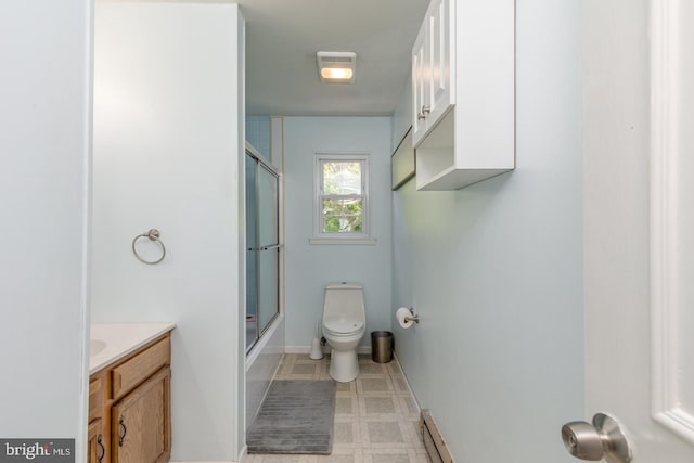 139 Shreve St, Mount Holly, NJ 08060 - full bathroom with toilet, vanity, baseboards, a baseboard radiator, and enclosed tub / shower combo