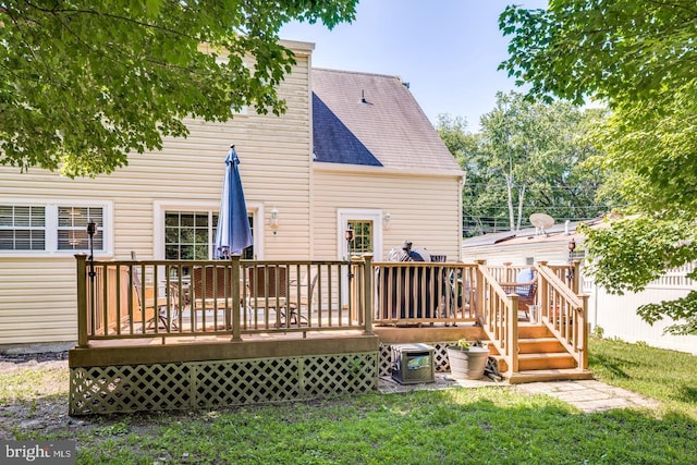 139 Shreve St, Mount Holly, NJ 08060 - rear view of property featuring a lawn, roof with shingles, and a deck