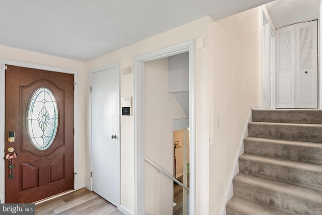 7627 Fallswood Way, Lorton, VA 22079 - entryway featuring light wood-style floors and stairway