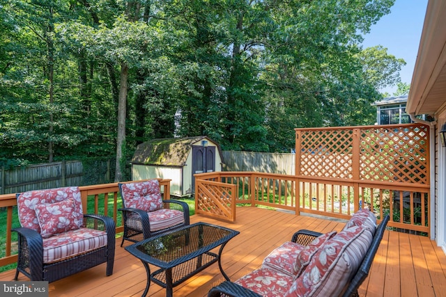 7627 Fallswood Way, Lorton, VA 22079 - wooden terrace featuring a fenced backyard and a storage shed