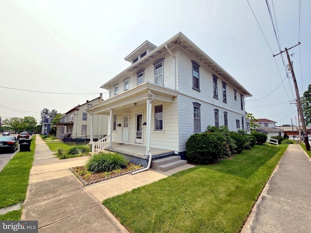 33 N Washington St, Cleona, PA 17042 - american foursquare style home featuring covered porch and a front lawn