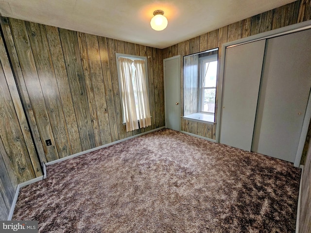 33 N Washington St, Cleona, PA 17042 - carpeted empty room with wood walls