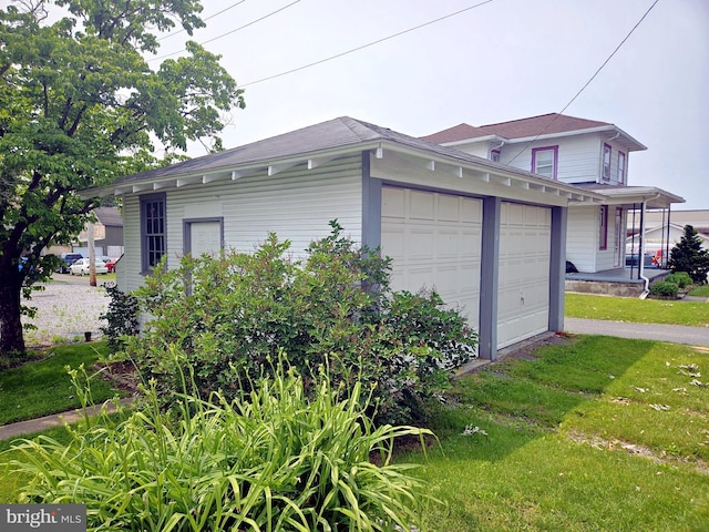 33 N Washington St, Cleona, PA 17042 - view of home's exterior with an attached garage, a yard, and driveway