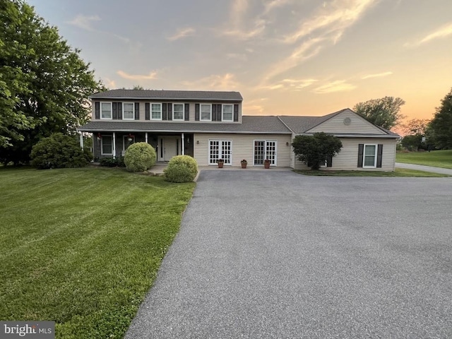2688 Lydia Ct, Adamstown, MD 21710 - view of front facade featuring driveway, a front lawn, and a porch
