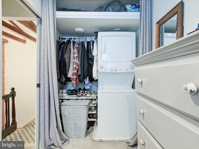 1510 N Leithgow St, Philadelphia, PA 19122 - washroom with stacked washing machine and dryer and carpet floors