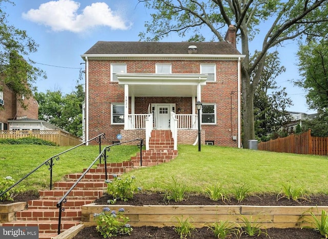 1821 Shepherd St NE, Washington, DC 20018 - view of front facade featuring brick siding, a shingled roof, and a chimney