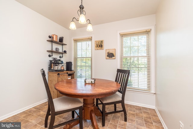 1993 Ryans Run, Lansdale, PA 19446 - dining room with healthy amount of natural light, baseboards, stone finish floors, and a chandelier