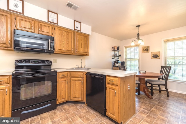 1993 Ryans Run, Lansdale, PA 19446 - kitchen with black appliances, a sink, a peninsula, and light countertops