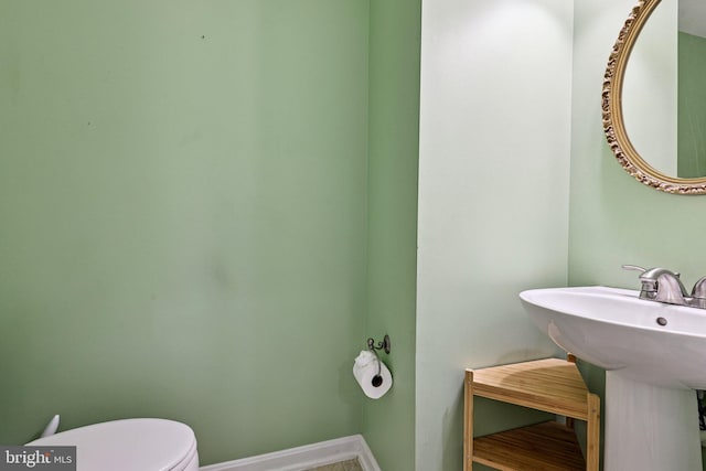 11793 Nates Pl, Woodbridge, VA 22192 - half bathroom featuring toilet and a sink