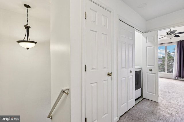 11793 Nates Pl, Woodbridge, VA 22192 - hallway with light carpet, an upstairs landing, and washer / clothes dryer