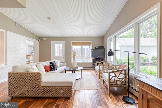 512 Piccadilly Rd, Baltimore, MD 21204 - living room featuring lofted ceiling, wood finished floors, and a baseboard radiator
