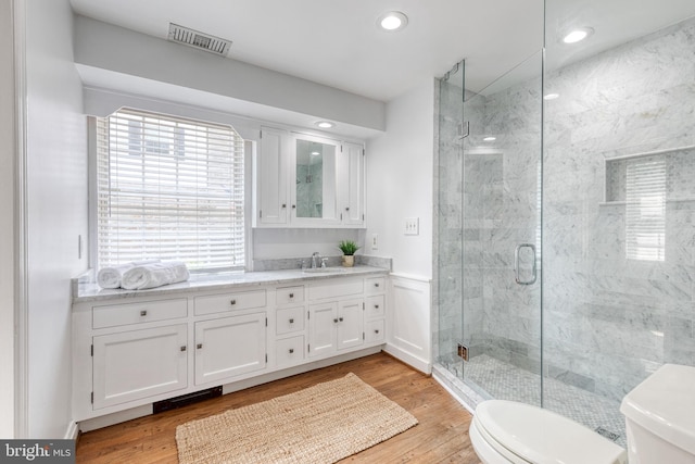 512 Piccadilly Rd, Baltimore, MD 21204 - bathroom with toilet, vanity, a shower stall, healthy amount of natural light, and recessed lighting