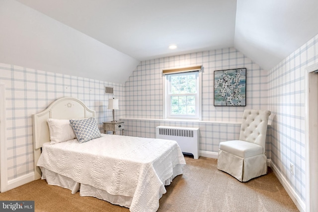 512 Piccadilly Rd, Baltimore, MD 21204 - carpeted bedroom featuring radiator, vaulted ceiling, wallpapered walls, and baseboards