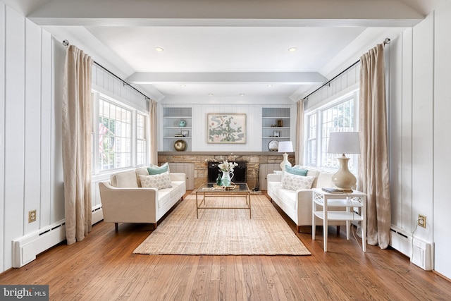 512 Piccadilly Rd, Baltimore, MD 21204 - living area featuring healthy amount of natural light, hardwood / wood-style flooring, baseboard heating, and beamed ceiling