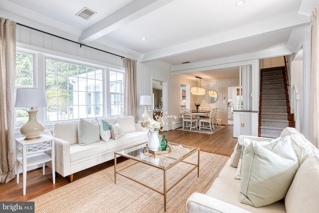 512 Piccadilly Rd, Baltimore, MD 21204 - living area with beam ceiling, wood finished floors, and stairway