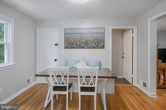 6001 Kroy Ct, Springfield, VA 22150 - dining room with light wood-style flooring and baseboards