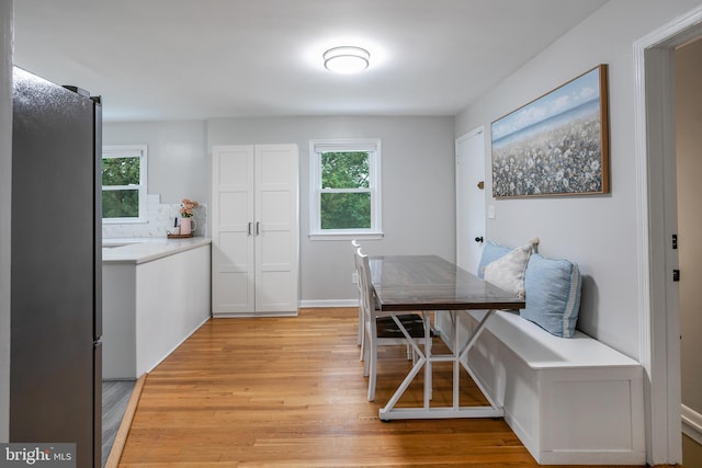 6001 Kroy Ct, Springfield, VA 22150 - dining area with light wood finished floors and healthy amount of natural light