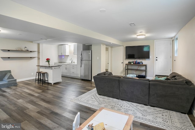 6001 Kroy Ct, Springfield, VA 22150 - living area featuring dark wood-style floors and baseboards